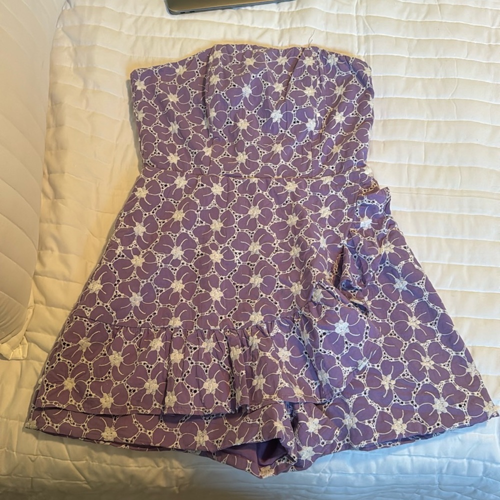 Lavender romper with flower pattern